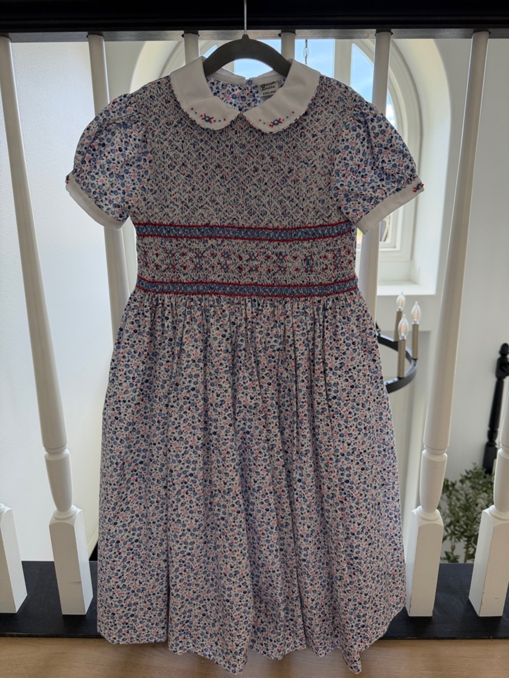 Girls' White Floral Smocked Dress with Blue and Red Accents